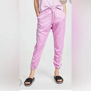 FREE CITY SATIN JUMP PANT IN PINK CLOUD. SIZE L